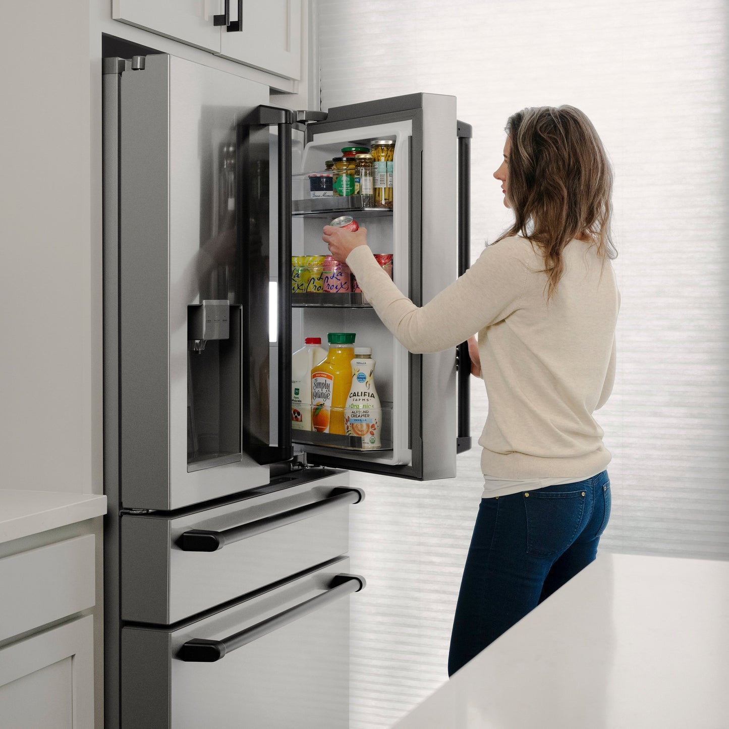 ZLINE Autograph Edition 36 in. 21.6 cu. ft. Counter-Depth French Door Refrigerator with Water and Ice Dispenser in Fingerprint-Resistant Stainless Steel with Matte Black Traditional Handles (RFMZ-W-36-MB)